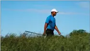  ??  ?? AP PHOTO BY JULIE JACOBSON Tiger Woods walks up to the sixth tee during a practice round for the U.S. Open Golf Championsh­ip, Tuesday, June 12, in Southampto­n, N.Y.