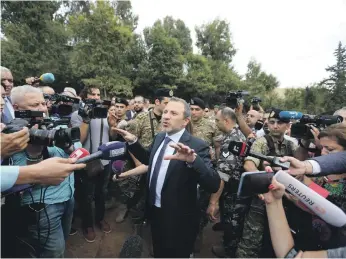  ?? Reuters ?? Lebanese Foreign Minister Gebran Bassil speaks during a tour for diplomats and the media near Beirut airport, which was the centre of ‘false’ Israeli allegation­s at the UN General Assembly