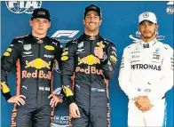  ?? MARK THOMPSON / AFP ?? Podio. Ricciardo (c) fue el más rápido seguido por Verstappen (i) y Hamilton (d).