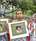  ?? SAZZAD HOSSAIN/AFP ?? Women hold placards of Nusrat Jahan Rafi.