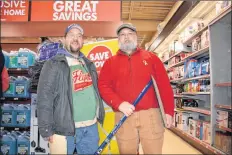  ?? COLIN CHISHOLM ?? Scott Caldwell (left) and Alan Pemberton, two major hockey fans, stopped by to see Wendel Clark when he visited Windsor Home Hardware to get an autograph or two.
