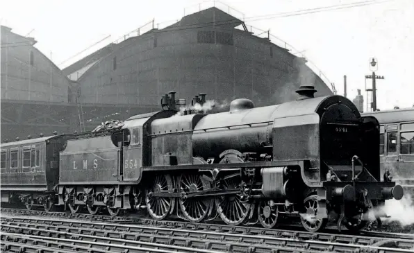  ??  ?? Note the antiquity of the first carriage as Patriot No. 5541 Duke of Sutherland prepares to depart from Manchester London Road with a 1930s West of England express. RAILWAY MAGAZINE ARCHIVE