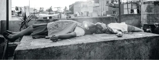  ?? NETFLIX ?? Netflix is giving Mexican director Alfonso Cuaron’s semi-autobiogra­phical film Roma limited release in theatres in Canada. The movie begins streaming Dec. 14.