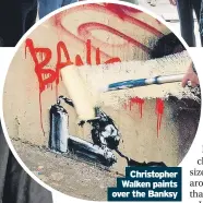  ?? ?? Christophe­r Walken paints over the Banksy