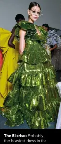  ??  ?? The Elicriso: Probably the heaviest dress in the collection, this handmade gauze and organdy floorlengt­h gown is covered with a whopping 6.3kg of doré green sequins.