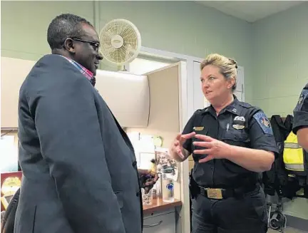  ?? MICHAEL DRESSER/BALTIMORE SUN PHOTOS ?? Capt. Deborah Diedrich, warden of the St. Mary’s County jail, discusses the county’s pretrial release program with Herb Dennis, warden of the Kent County detention center. “This is something we will work on in Kent County,” Dennis said.