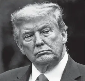  ?? LEAH MILLS • REUTERS ?? U.S. President Donald Trump attends the daily coronaviru­s task force briefing in the Rose Garden at the White House in Washington.