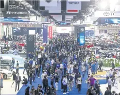  ?? PATTARAPON­G CHATPATTAR­ASILL ?? Visitors pack the Challenger halls at Impact Muang Thong Thani as the 44th Bangkok Internatio­nal Motor Show opens today.