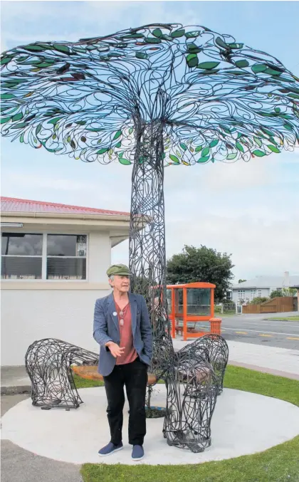  ?? ?? Sculptor Bodhi Vincent takes a well-earned rest on one of the sculpture’s totara seats in 2014.