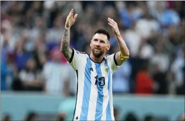  ?? NATACHA PISARENKO — THE ASSOCIATED PRESS ?? Argentina’s Lionel Messi celebrates after his teammate Julian Alvarez scored his side’s third goal during their semifinal win over Croatia on Dec. 13.