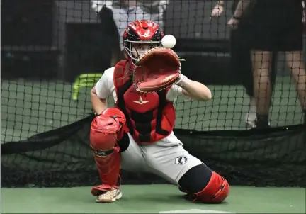  ?? ALISSA NOE — LONGMONT TIMES-CALL ?? Tyler Reyburn, a 17-year-old junior at Mead, began training at Vtool in Broomfield to help him elevate his game behind the plate and beside it.
