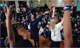  ?? Photograph: Gideon Mendel/Corbis/Getty ?? Pupils at Millfields community school in London perform an African dance during a school assembly as part of Black History Month.