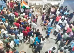  ?? DC ?? Students stage a protest against the Delhi police on Manuu campus in the city on Tuesday. —