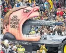  ?? Photo /AP ?? A carnival float in Duesseldor­f, Germany following the terror attacks in Hanau.