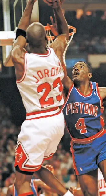  ??  ?? Michael Jordan shoots over the Pistons’ Joe Dumars during the 1991 NBA Eastern Conference finals.