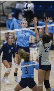  ?? (Special to the NWA Democrat-Gazette/David Beach) ?? Springdale Har-Ber’s Kat Cooper (center) goes up for the kill during Tuesday’s match against Greenwood at Wildcat Arena in Springdale. Cooper had 10 kills in the Lady Wildcats’ 3-0 victory over the Lady Bulldogs in their season opener.