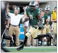  ?? AP/DAVID ZALUBOWSKI ?? Wide receiver Olabisi Johnson is averaging 19.9 yards per catch this season for Colorado State and leads the Rams with 3 touchdown catches.