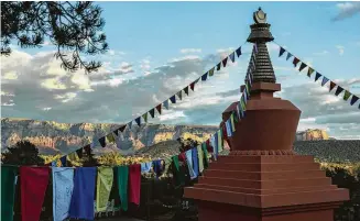  ??  ?? The Amitabha Stupa and Peace Park in Sedona, Ariz., features a 36-foot stupa, or Buddhist shrine, adorned with thousands of prayer scrolls, a large copper cauldron, vases and many ordinary items. A nearby sign informs visitors it is most beneficial to...