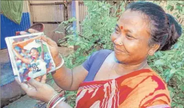  ?? PTI ?? Asian Games heptathlon gold winner Swapna Barman’s mother Basana, who worked in a tea garden, at her home in Jalpaiguri.