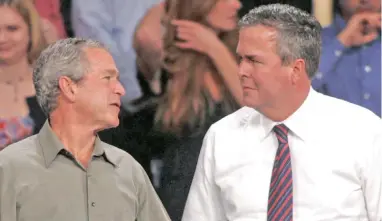  ?? PICTURE: AP ?? POINTS OF DIFFERENCE: Jeb Bush, right, insists his views on foreign policy are not influenced by the presidenti­al legacy of his brother, George W Bush, left.