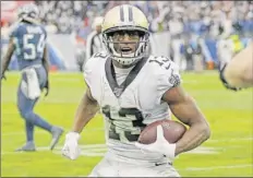  ?? James Kenney / Associated Press ?? Saints receiver Michael Thomas, who hurt his ankle in the opener, set an NFL record with 149 catches last season.