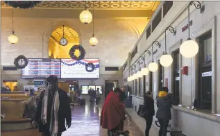  ?? File photo ?? Travelers wait for trains at New Haven’s Union Station.