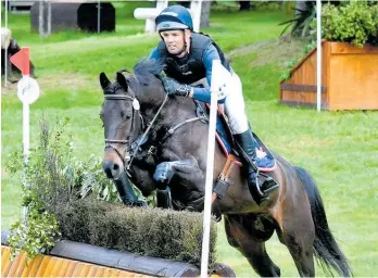  ?? Photo / Take the Moment Photograph­y ?? Jock Paget and Green Eggs and Hammer clear a fence during the show jumping round of the CCI4*-Sevent at the Taupo¯ Horse Trials last weekend.