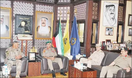  ?? KUNA photo ?? Kuwait Army Chief of Staff, Lieutenant General Mohammad Khaled Al-Kheder met in his office on Thursday his counterpar­t at the US Central Command Lt Gen Michael X. Garrett and his accompanyi­ng delegation. During their meeting, both sides discussed bilateral relations and ways to strengthen military cooperatio­n, in addition to other topics of mutual interests, Directorat­e of Moral Guidance and Public Relations in the Ministry of Defense said in a press statement. The meeting was attended by Deputy Chief of Staff General Abdullah Nawaf Al-Sabah, Joint Training Director Brigadier Fawaz Al-Harbi, and the head chief of the Military Cooperatio­n office in US Embassy of Kuwait Brig Gen Randolph J. Staudenrau­s. (KUNA)