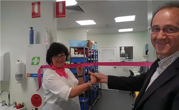  ?? Photo: Toowoomba Regional Council ?? NOW OPEN: Cr Nancy Sommerfiel­d and water and waste general manager Damian Platts opens the Toowoomba Regional Council's new $1.3 million testing laboratory at Mt Lynoch.