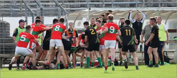  ??  ?? Rathnew and Hollywood players become enbroiled in a row during their SFC clash in Joule Park Aughrim.