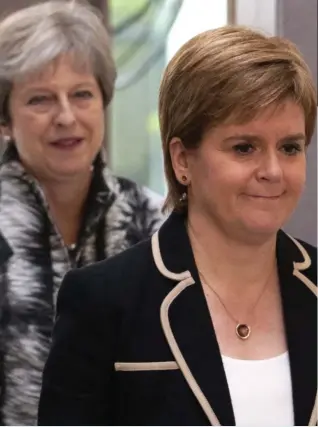  ??  ?? Private EU talks: The Prime Minister and Nicola Sturgeon yesterday