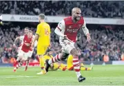  ?? REUTERS ?? Arsenal’s Alexandre Lacazette celebrates his goal against Palace.