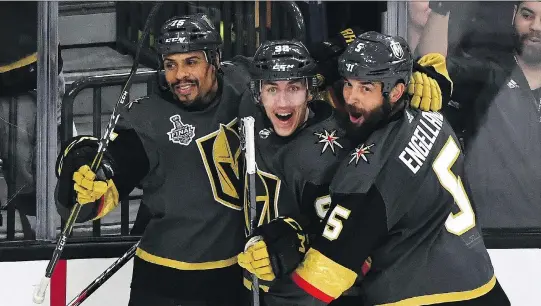  ?? ETHAN MILLER/GETTY IMAGES ?? Tomas Nosek, centre, of the Golden Knights reacts after scoring the game-winning goal in Monday’s Game 1 of the Stanley Cup final in Las Vegas.