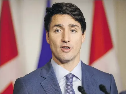  ?? — THE CANADIAN PRESS ?? Prime Minister Justin Trudeau’s Liberal government must decide how to handle an influx of funds coming from an unexpected economic surge in early 2017.