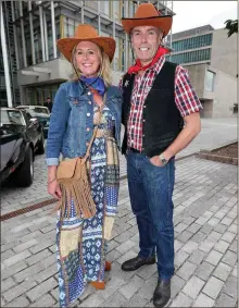 ?? Photo by Jim Coughlan. ?? Cork County Council Chief Executive Tim Lucy and his wife Denise helped set the tone for the night in their Wild West outfits.