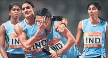  ??  ?? Banned athletes, Ashwini Akkunji (right) and Mandeep Kaur (centre) were a part of the 4x400m team that won gold at the Delhi Commonweal­th Games in 2010.