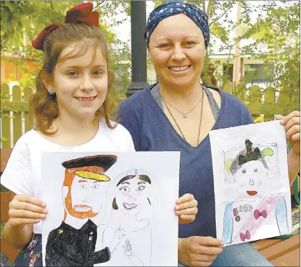  ??  ?? When Amy Naef was nine she won a drawing competitio­n related to the Queen’s 1992 visit. 26 years later and her 9-year-old daughter Stella has produced a Prince Harry and Meghan portrait to be proud of. PHOTO: DUBBO PHOTO NEWS