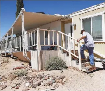  ?? Robert Gauthier Los Angeles Times ?? CHARLES HAWKINS’ Ridgecrest home was severly damaged. Some 20% of Ridgecrest residents have quake insurance, close to the percentage in L.A. and Orange counties but about twice the state average.