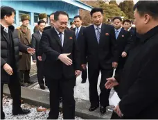  ?? AP ?? Chairman of North Korea’s reunificat­ion committee, Ri Son-gwon, centre, meets officials from the South in the Demilitari­sed Zone