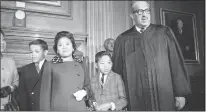  ?? HENRY GRIFFIN — THE ASSOCIATED PRESS ?? Supreme Court Associate Justice Thurgood Marshall, right, and his wife, Cecilia, stand with other family members as they watch him take his seat on the high court for the first time in 1967.