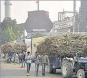  ?? HT FILE ?? Sugarcane farmers are reaping a bumper crop but have been forced to make a beeline for cooperativ­e mills such as this one in Shaheed Bhagat Singh Nagar with private mills yet to begin crushing this season.