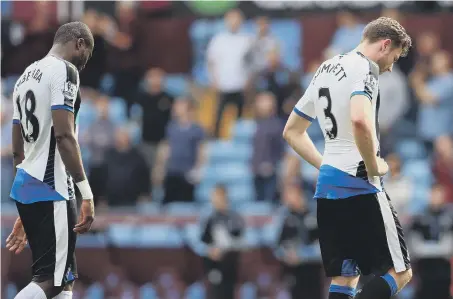  ??  ?? Chancel Mbemba (left) and Paul Dummett despair at the end of Newcastle’s draw at Villa, while Aleksandar Mitrovic (below) rues a missed chance