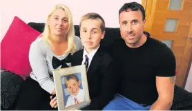  ??  ?? Our boy Mum Karen, son Lewis (15) and dad Gordon rememberin­g Owen