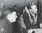  ?? Submitted photo ?? Navigator Ed Free, left, and pilot Dick Sanderson attend a mission briefing in England in 1944.