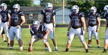  ?? PILOT PHOTO/RON HARAMIA ?? Laville’s AJ Bedock (78), Lucas Plummer (9) and Garrett Wagoner (72) were three of the five Lancers named first-team ALL-HNAC for football.