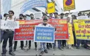  ?? ARUN SHARMA/HT ?? Representa­tives of training partners protest against discrimina­tion’ in seat allocation on Wednesday.