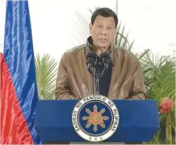 ??  ?? President Rodrigo Duterte holds a news conference at the Davao City airport.
