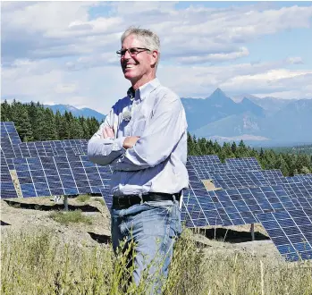  ??  ?? Kimberley Mayor Don McCormick at the site of the town’s SunMine solar energy project, a joint venture featuring solar panels that can tilt to maximize exposure to the sun’s rays.