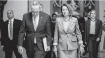  ?? J. Scott Applewhite / Associated Press ?? House Speaker Nancy Pelosi, Senate Minority Leader Chuck Schumer, D-N.Y., and other lawmakers’ priority must be to fund the government — without wasting money on a boondoggle.