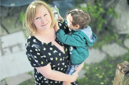  ?? RICHARD LAUTENS TORONTO STAR ?? Stephenie Summerhill took an unpaid leave to care for Felix, 3, and his older brother Oscar a few weeks into the Ontario lockdown. “I was trying to do a good job at work and trying to do a good job at home. And I was not doing a good job at either,” she says.